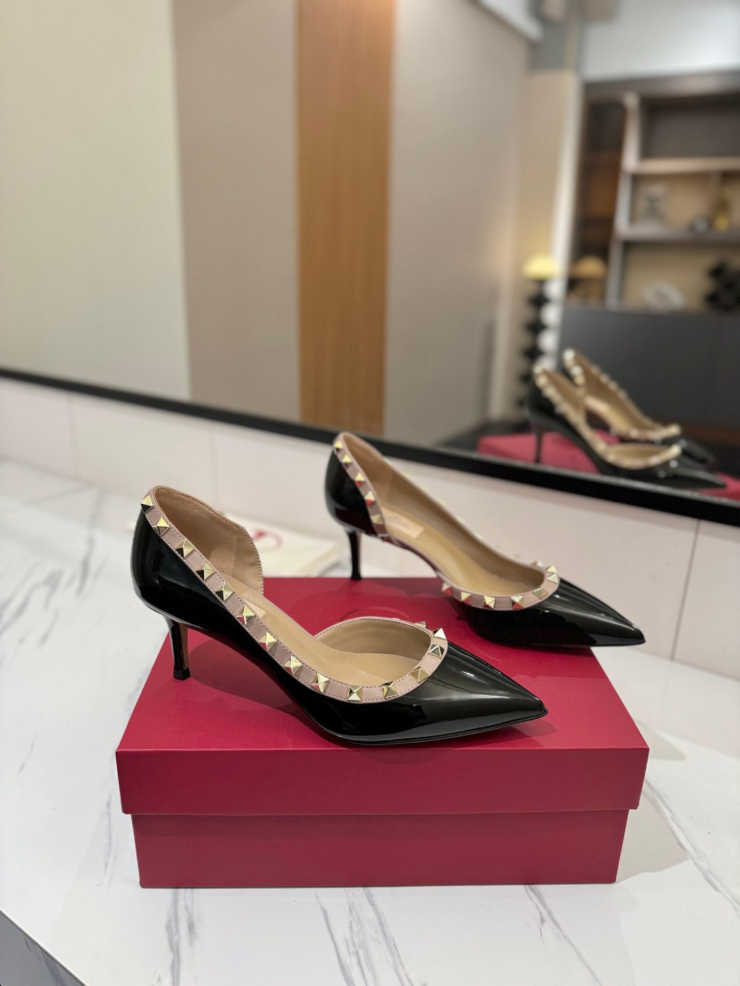 1:1 Valentino Classic Heels with Side Cutouts and Studded Design