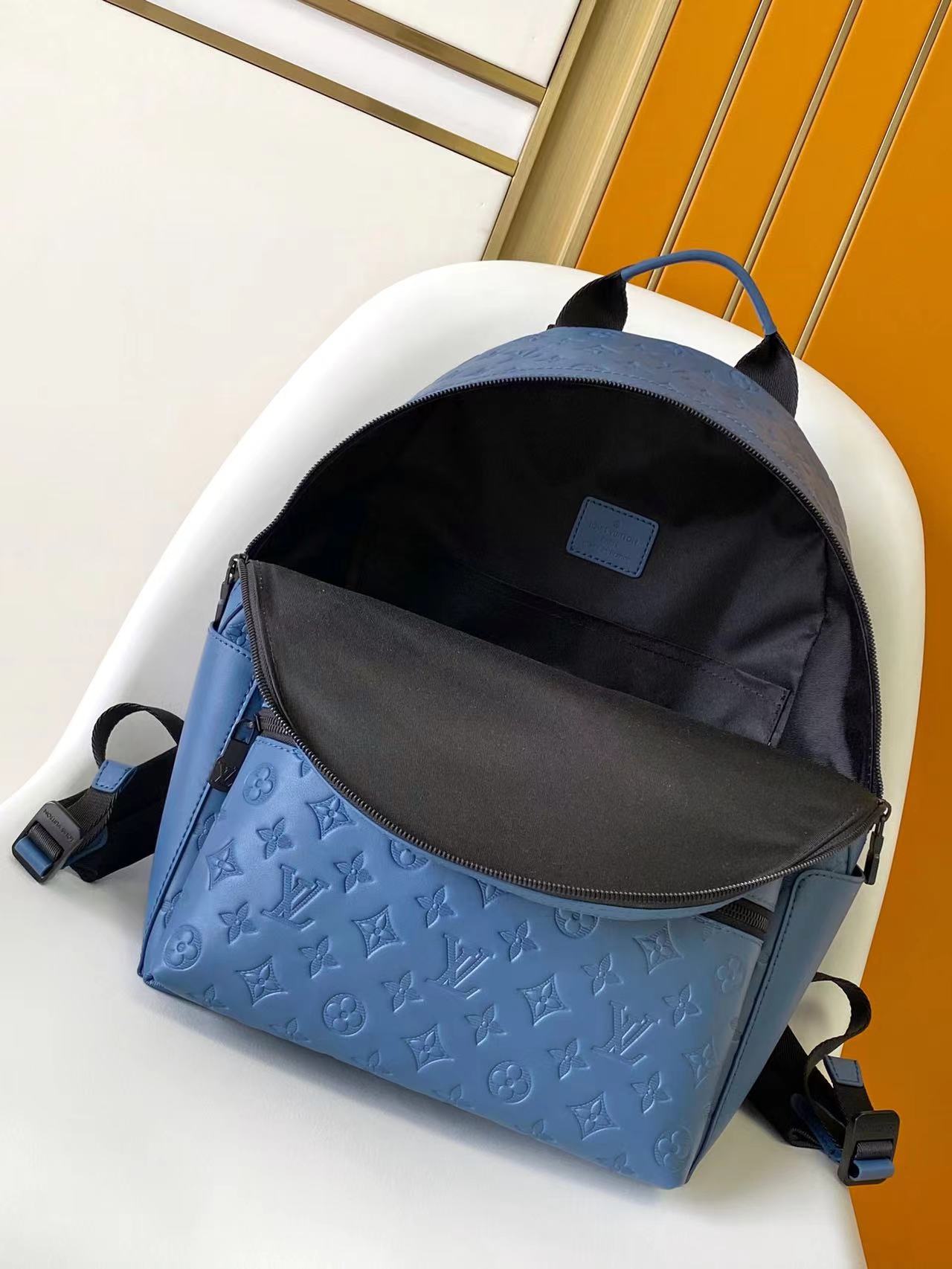 Top-Tier blue emboss Discovery Backpack