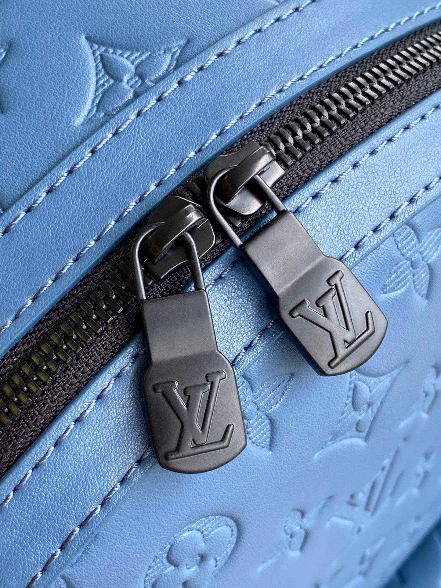 Top-Tier blue emboss Discovery Backpack