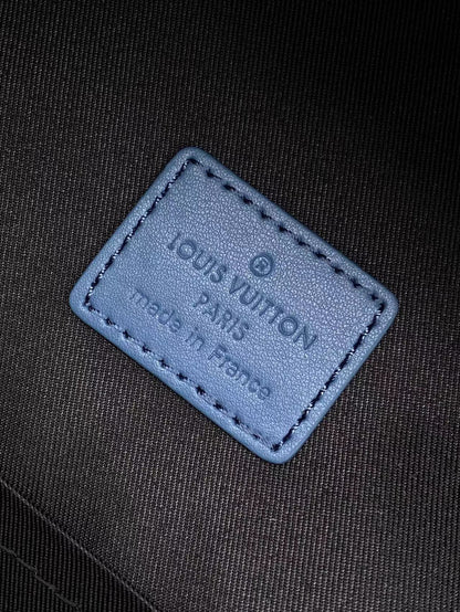 Top-Tier blue emboss Discovery Backpack