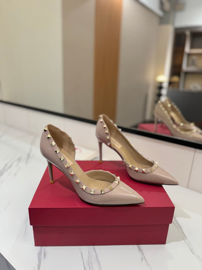 1:1 Valentino Classic Heels with Side Cutouts and Studded Design
