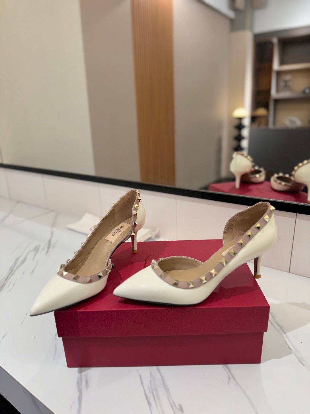 1:1 Valentino Classic Heels with Side Cutouts and Studded Design