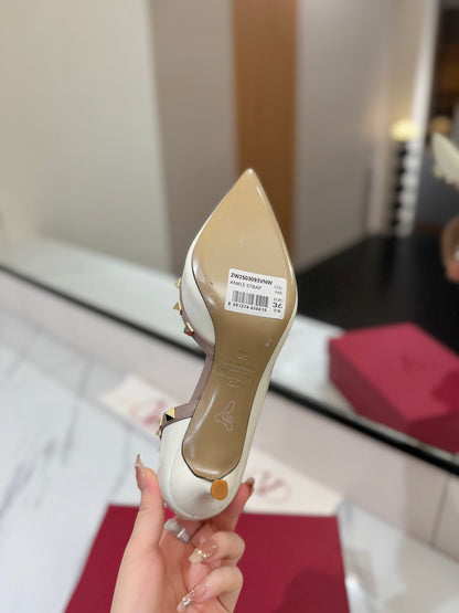 1:1 Valentino Classic Heels with Side Cutouts and Studded Design