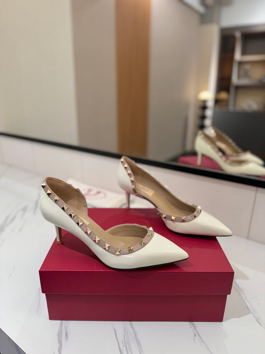 1:1 Valentino Classic Heels with Side Cutouts and Studded Design