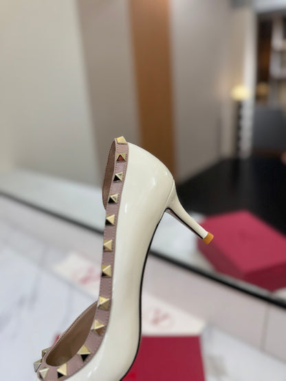 1:1 Valentino Classic Heels with Side Cutouts and Studded Design