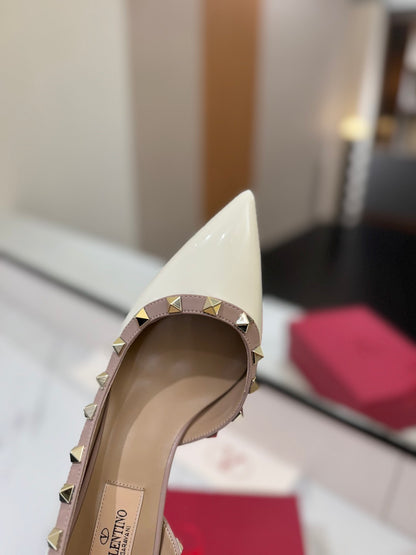 1:1 Valentino Classic Heels with Side Cutouts and Studded Design