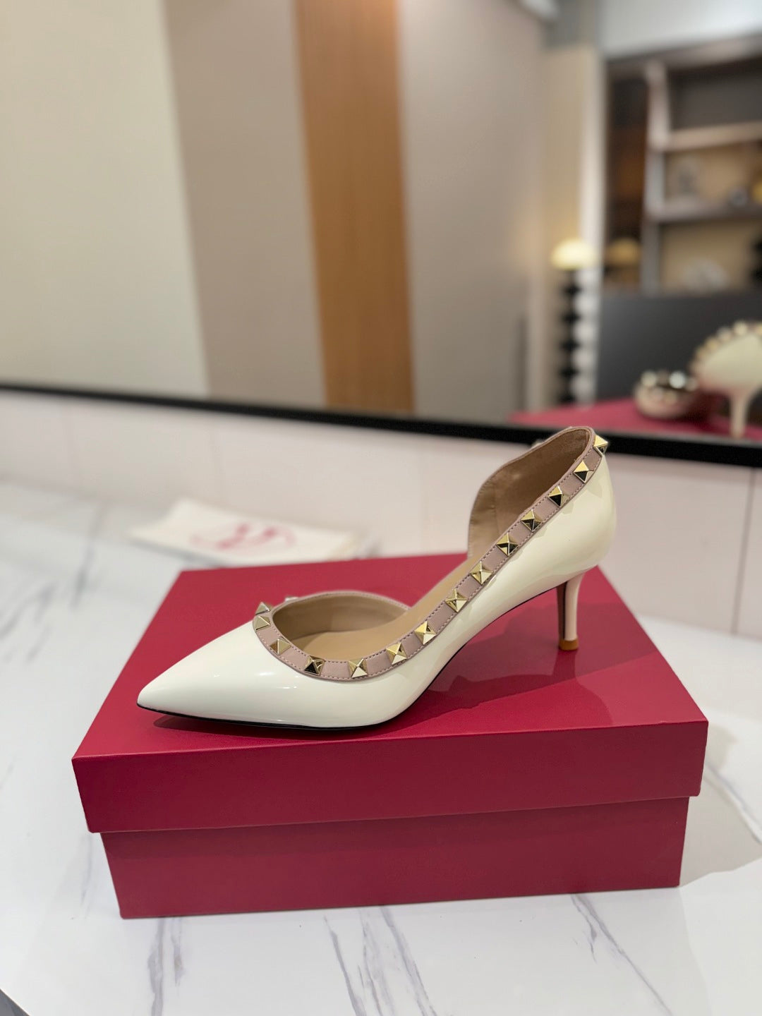 1:1 Valentino Classic Heels with Side Cutouts and Studded Design