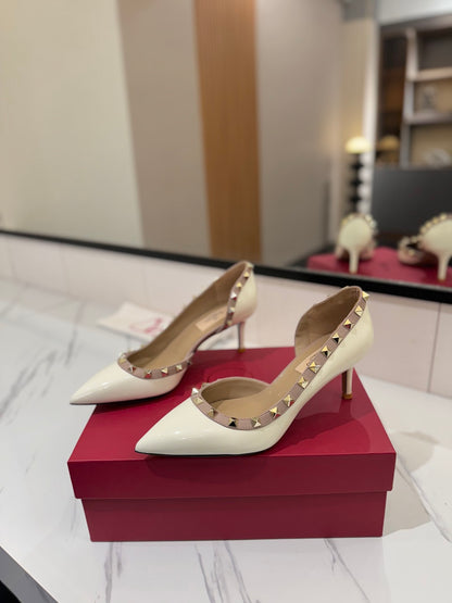 1:1 Valentino Classic Heels with Side Cutouts and Studded Design