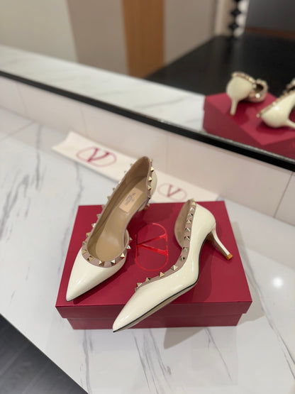1:1 Valentino Classic Heels with Side Cutouts and Studded Design