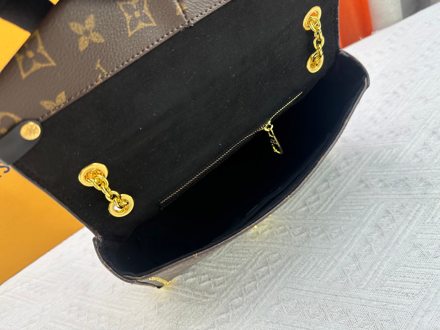 Top-quality Monogram Trunkie