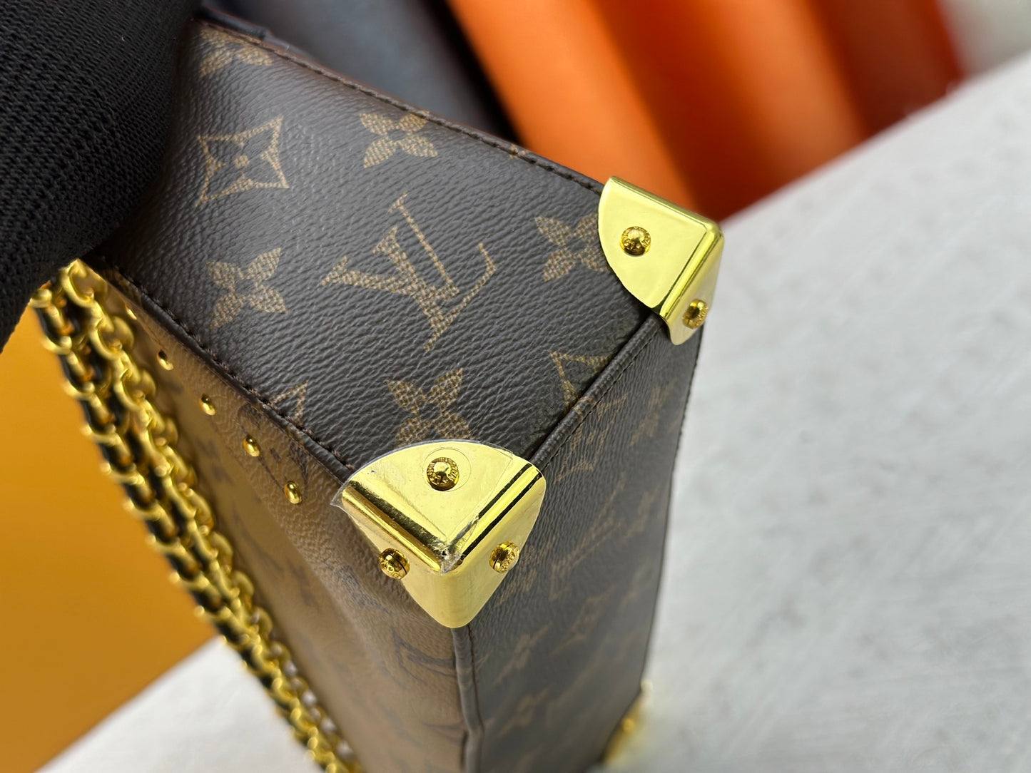 Top-quality Monogram Trunkie combines