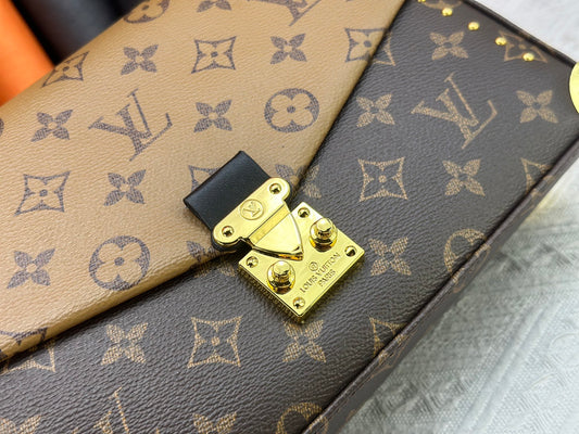 Top-quality Monogram Trunkie combines