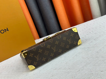 Top-quality Monogram Trunkie combines