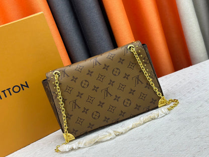 Top-quality Monogram Trunkie combines