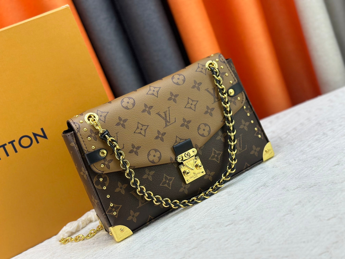 Top-quality Monogram Trunkie combines