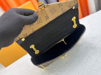 Top-quality Monogram Trunkie combines