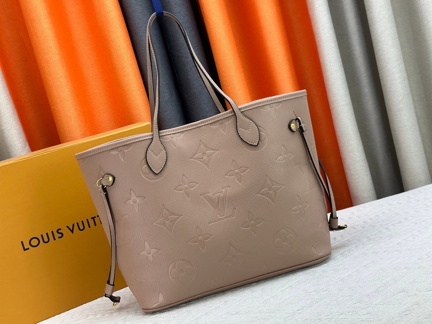 Top-tier Beige Emboss Monogram Neverfull MM