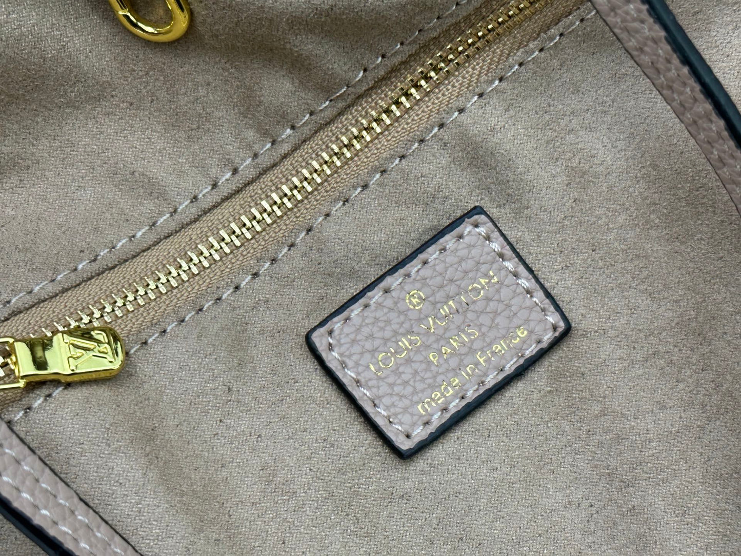 Top-tier Beige Emboss Monogram Neverfull MM