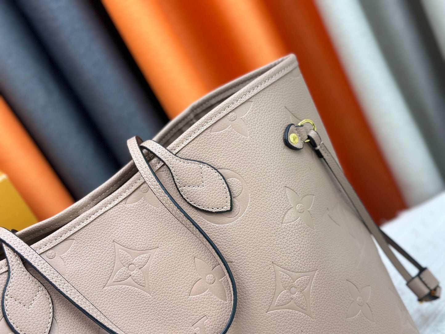 Top-tier Beige Emboss Monogram Neverfull MM