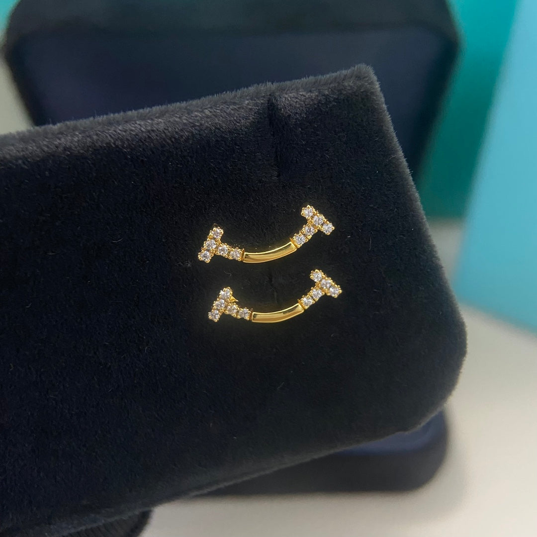 1:1 Tiffany half-diamond smiley face earrings