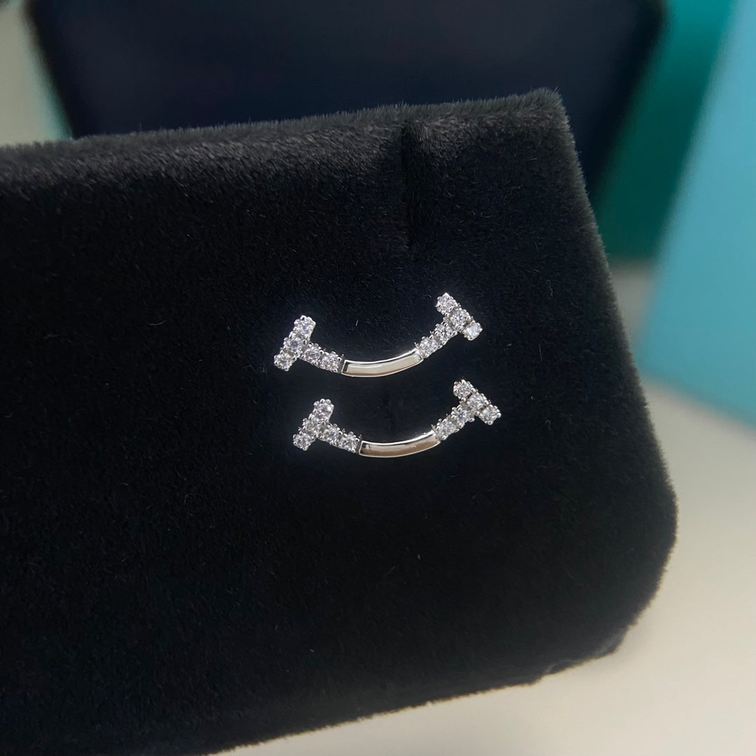 1:1 Tiffany half-diamond smiley face earrings